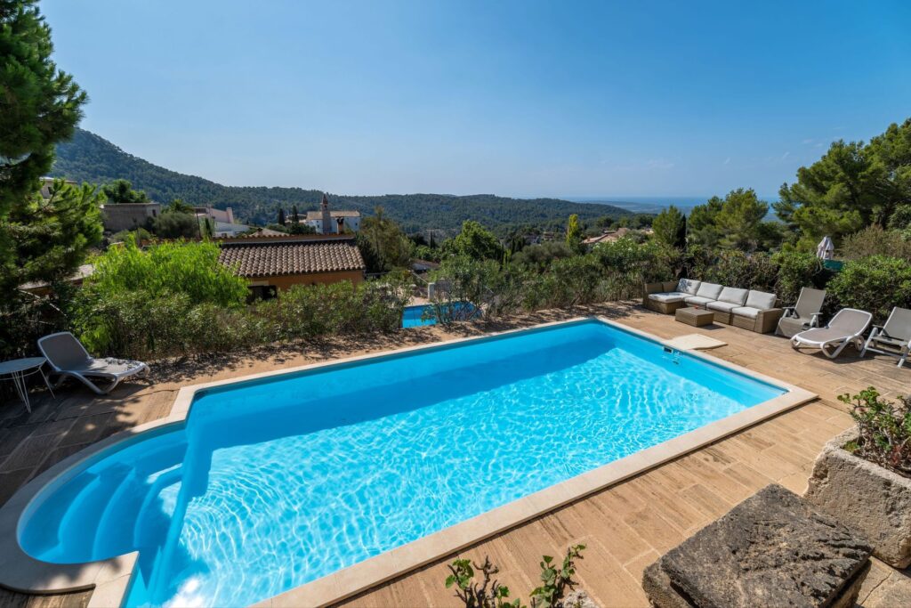 4-bedroom villa for sale in Puigpunyent, Mallorca with pool, terraces, and mountain views