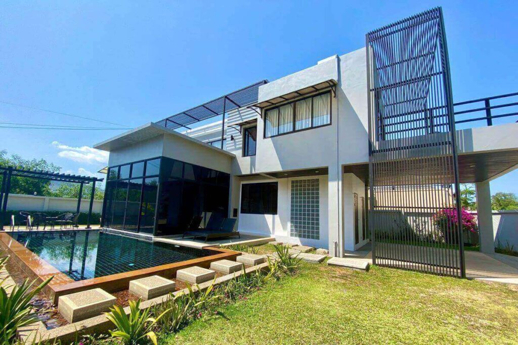 3-bedroom modern tropical villa with pool and wooden slat facade for sale in Rawai, Phuket