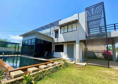 3-bedroom modern tropical villa with pool and wooden slat facade for sale in Rawai, Phuket