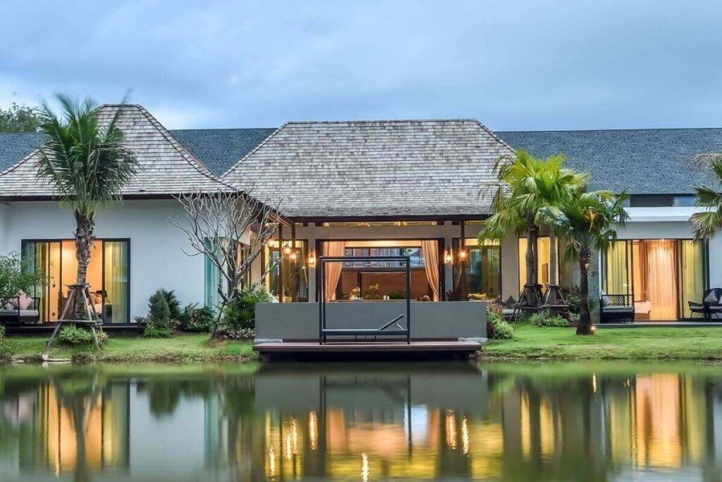 3-bedroom oriental-style lakeview pool villa with folding doors for sale in Cherng Talay, Phuket