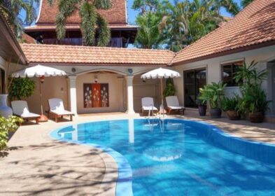 4-bedroom courtyard-style villa with pool and garden for sale near Nai Harn Beach, Phuket