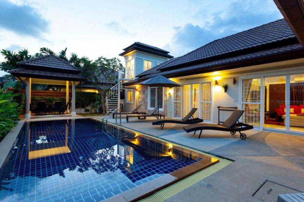 Modern 4-bedroom villa with private pool, tropical garden, and outdoor entertaining deck for sale in Rawai, Phuket – 215 sqm built-up