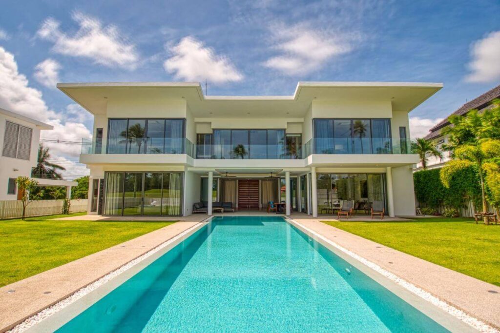 Modern 4-bedroom villa in Laguna Homes with pool, golf course views, and covered terraces