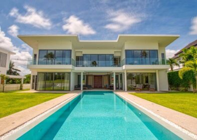 Modern 4-bedroom villa in Laguna Homes with pool, golf course views, and covered terraces