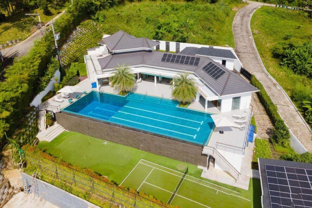 4-bedroom family villa in Chalong with sea views, golf simulator, pool, and sustainable features