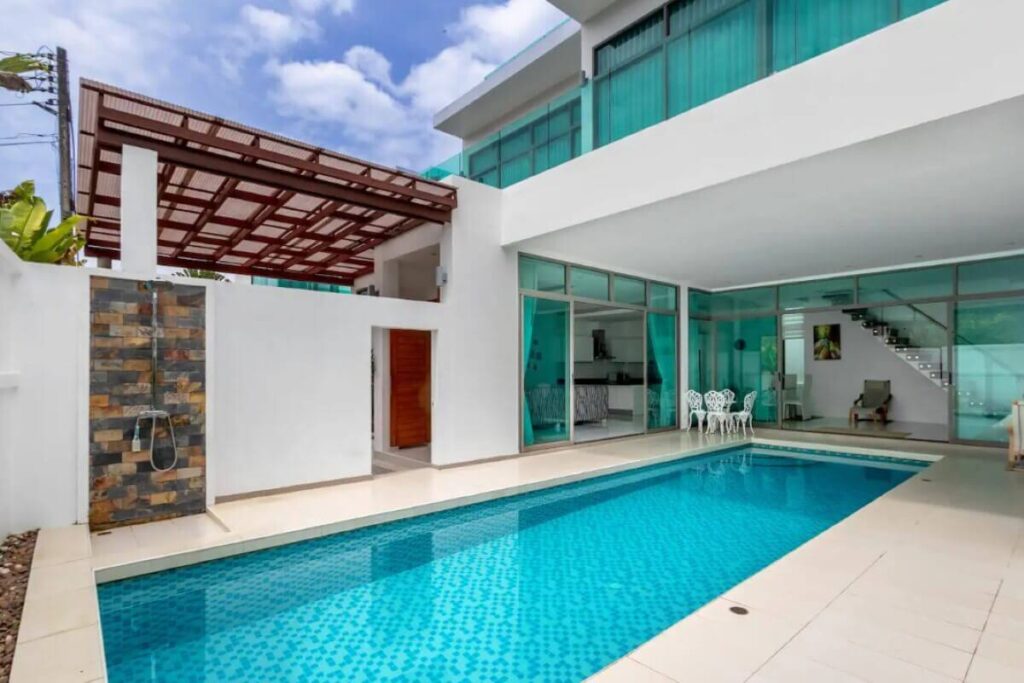 5-bedroom villa for sale near Kamala Beach, Phuket with pool, balconies, and mountain views