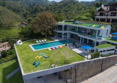 5-bedroom hillside villa in Patong, Phuket, with panoramic sea views, private pool, and luxury entertainment spaces.
