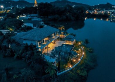 5-bedroom lakefront villa in Chalong with pool, balconies, and garden in gated family estate