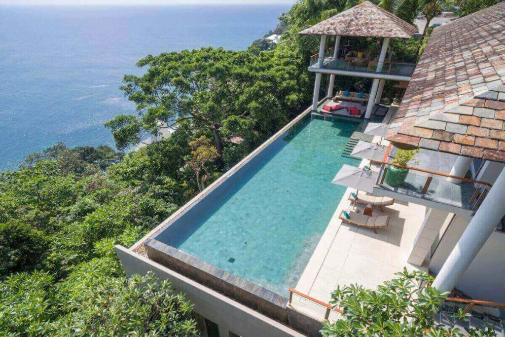 Ultra-luxury 6-bedroom oceanfront villa with infinity pool and panoramic Andaman Sea views in Kamala, Phuket.