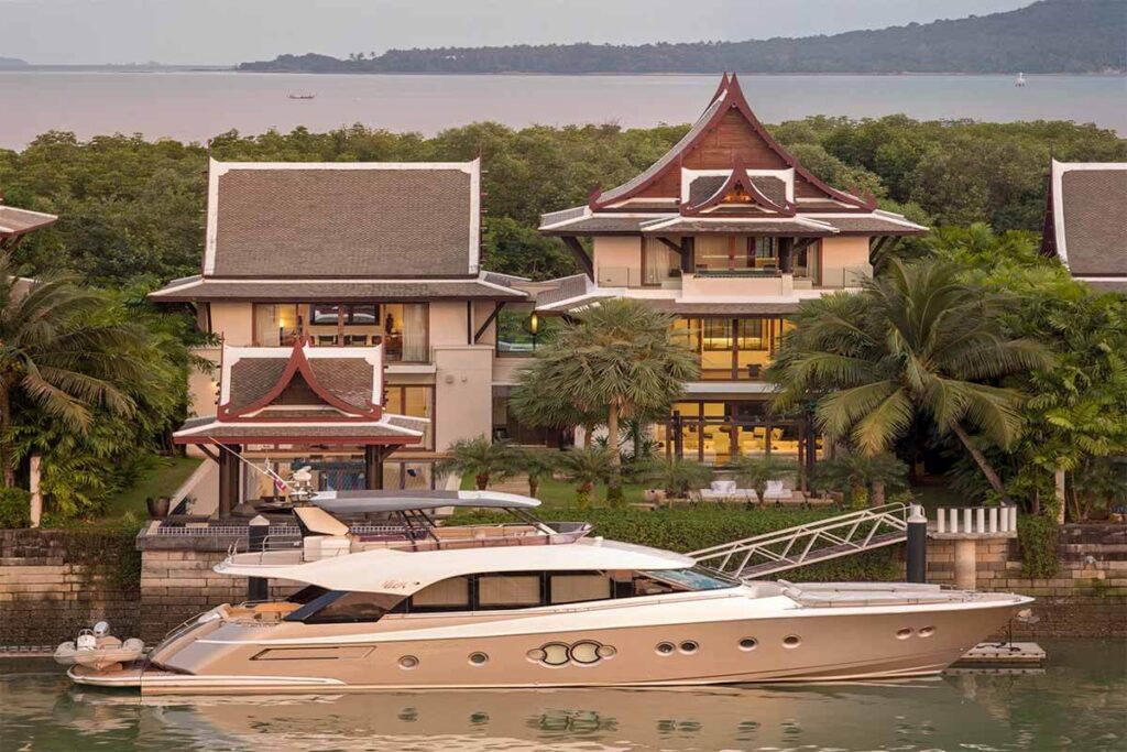 5-bedroom waterfront villa in Phuket with a private yacht berth, 20m pool, and luxury marina views.