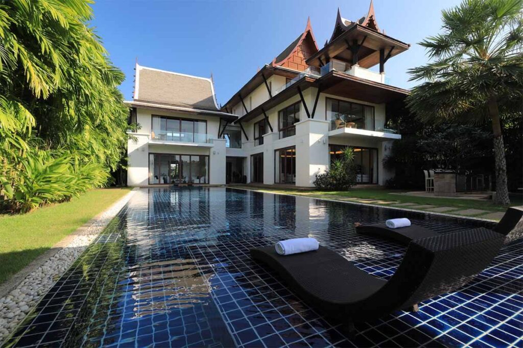5-bedroom waterfront villa in Phuket with private yacht berth, infinity pool, and luxury marina views.