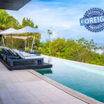 Luxury Phuket condo with infinity pool and foreign freehold badge.