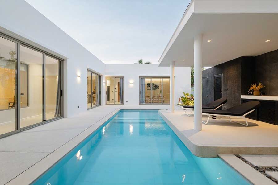 Courtyard-style 4-bed villa with pool for sale in Rawai, Phuket
