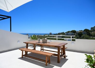 Modern triplex apartment with terraces and sea views in Cas Català, Calvià