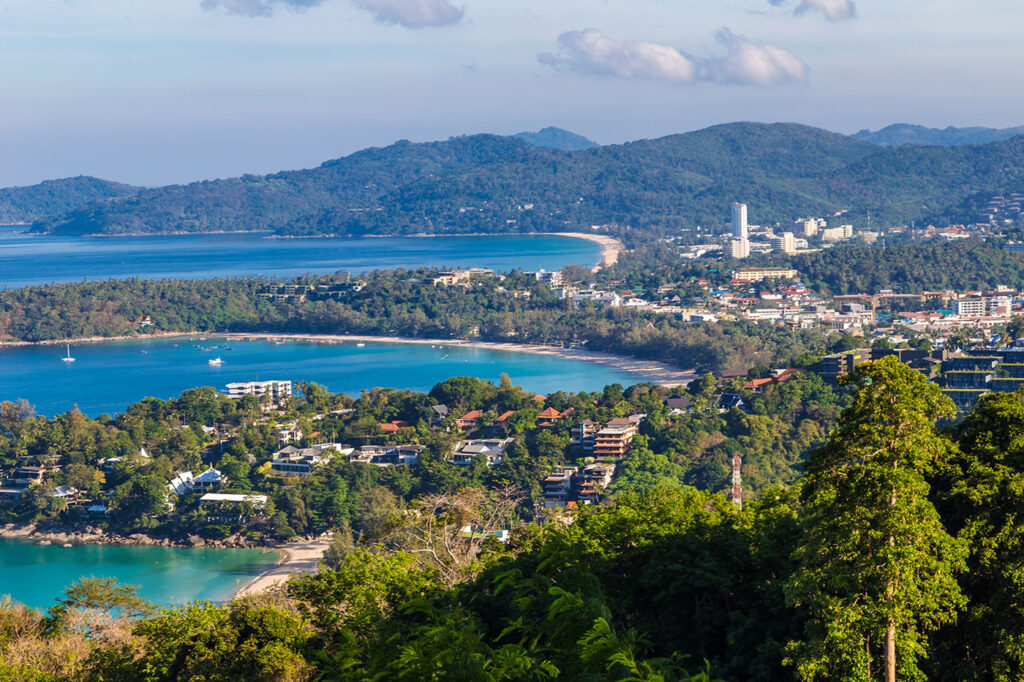View over Chalong Bay in South Phuket, showing hillside villas and coastline – context for freehold property ownership