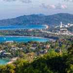 View over Chalong Bay in South Phuket, showing hillside villas and coastline – context for freehold property ownership