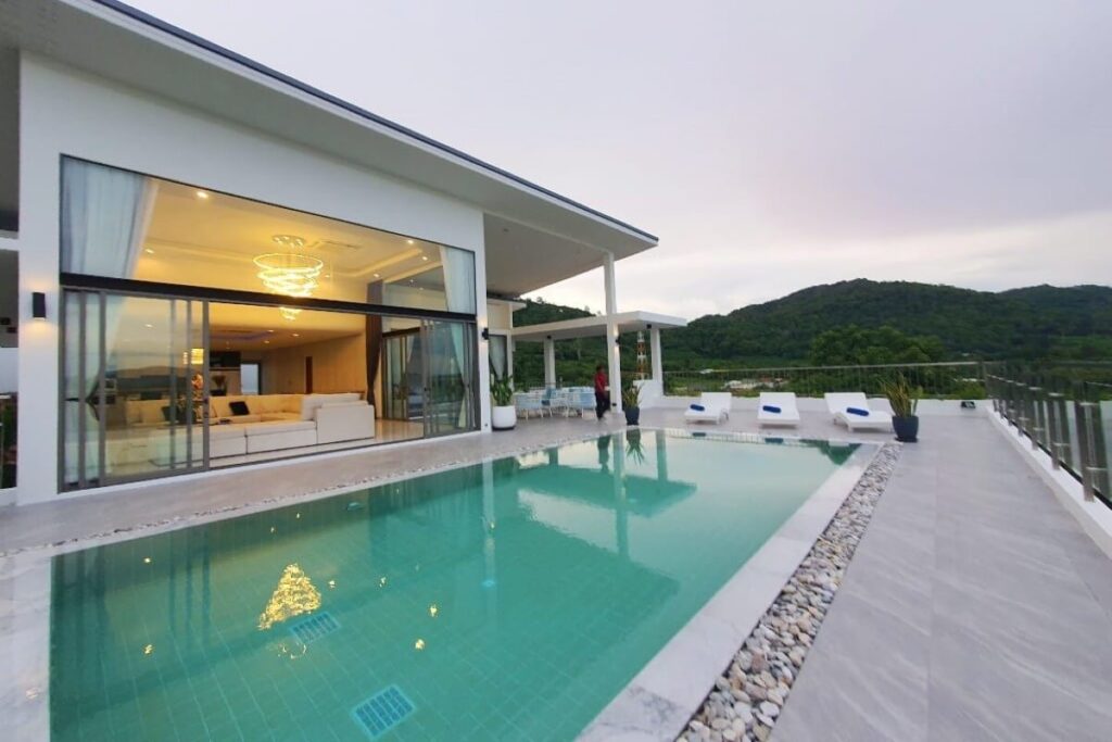 Contemporary 4-bed pool villa for sale on hillside in Nai Harn, Phuket