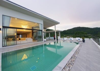 Contemporary 4-bed pool villa for sale on hillside in Nai Harn, Phuket
