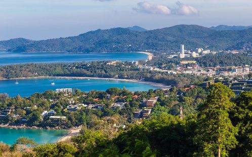 View over Chalong Bay in South Phuket, showing hillside villas and coastline – context for freehold property ownership